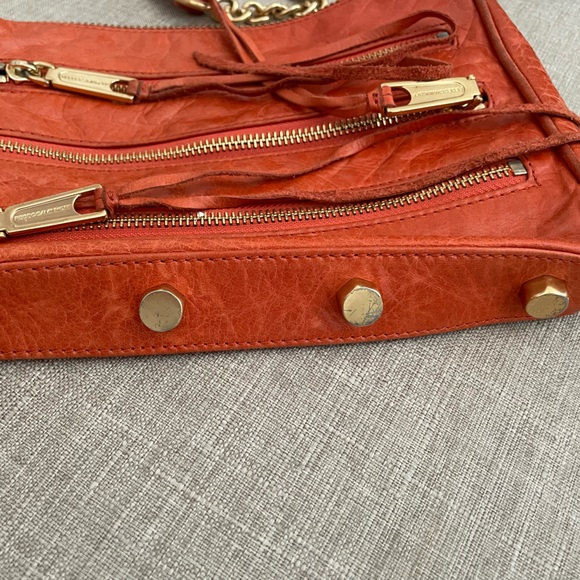 Rebecca Minkoff orange mini 5 zip crossbody bag. Pre-owned - Picture 2 of 11